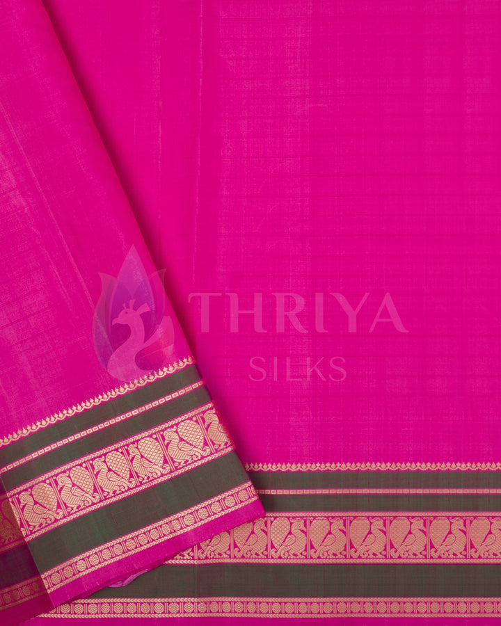 Pink blouse piece with zari and green border, part of black and pink Kanjivaram silk saree set