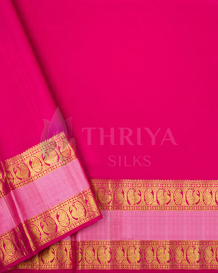 Plain magenta-pink blouse piece with golden zari border to match mint green floral saree