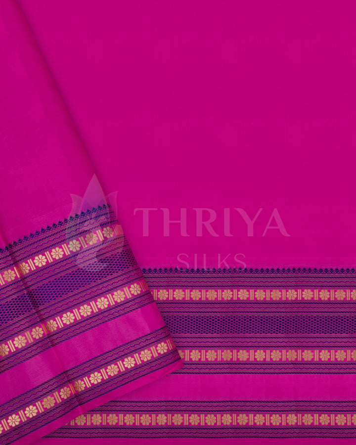 Matching pink Kanjivaram silk blouse piece with elegant zari border design