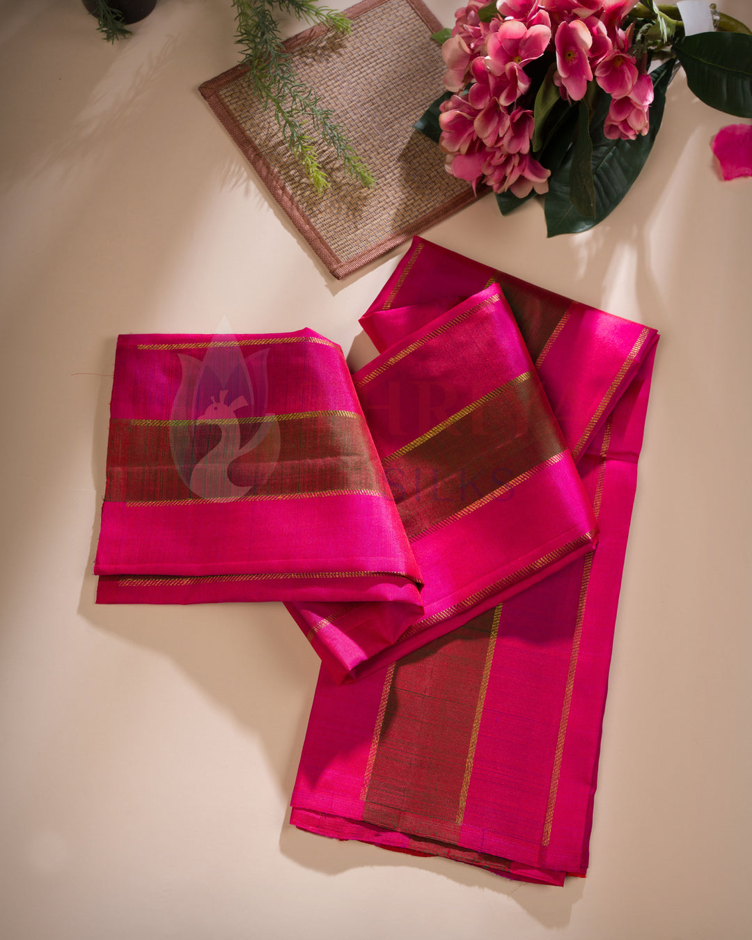 Pink silk dupatta with golden zari striped panels and elegant shine