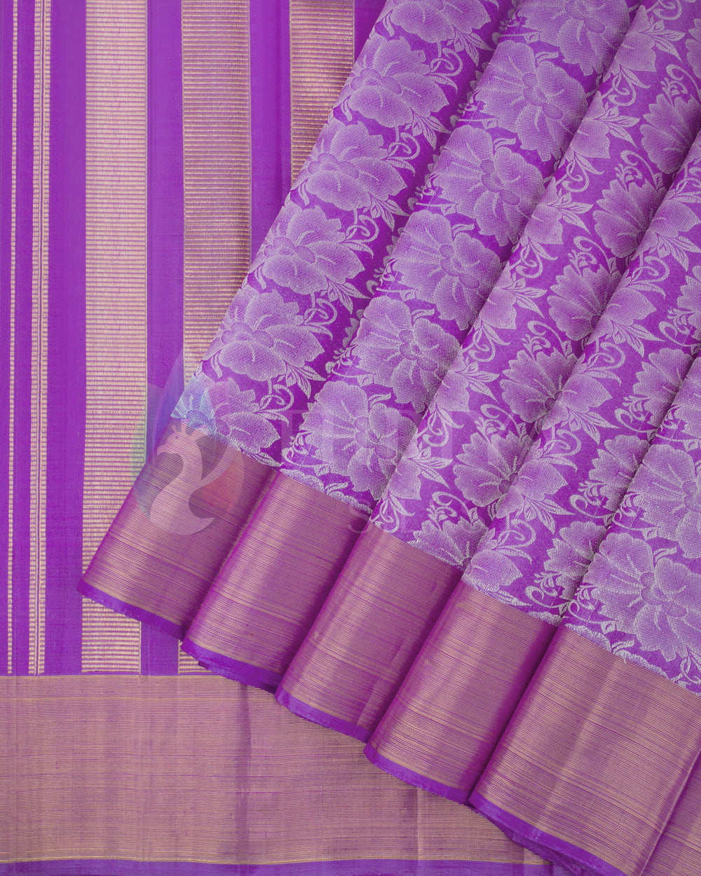 Purple Kanjivaram silk saree pleats with silver floral jacquard and golden zari border