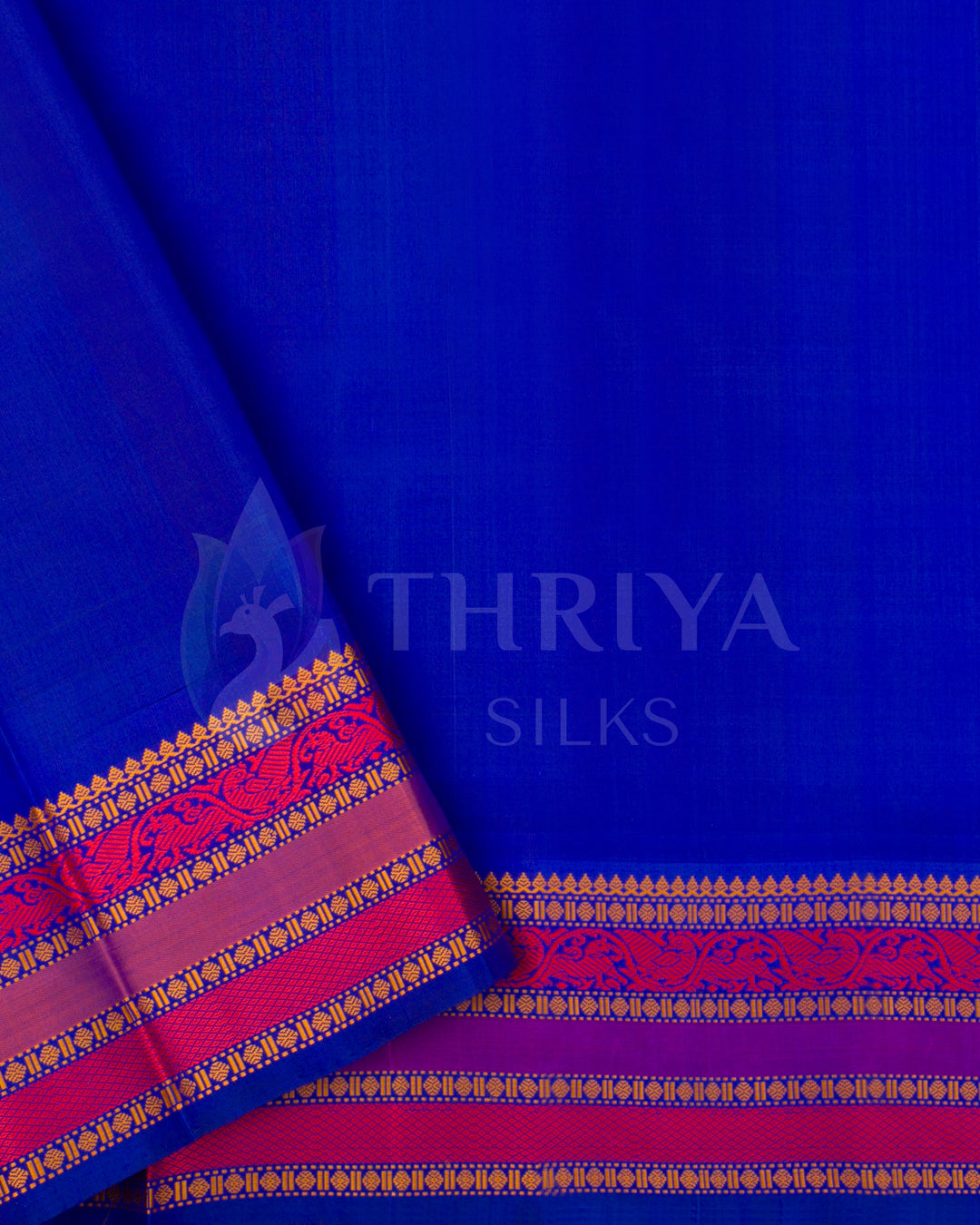 Royal blue blouse piece with magenta zari border – contrast combo for teal silk saree by Thriya Silks
