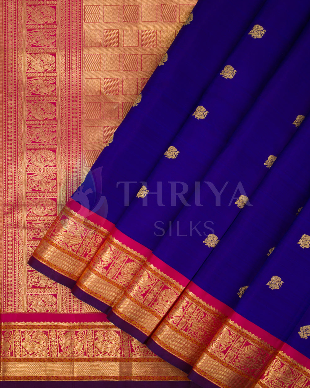 Royal blue and pink Kanjivaram silk saree featuring intricate gold zari pallu and border – front view from Thriya Silks