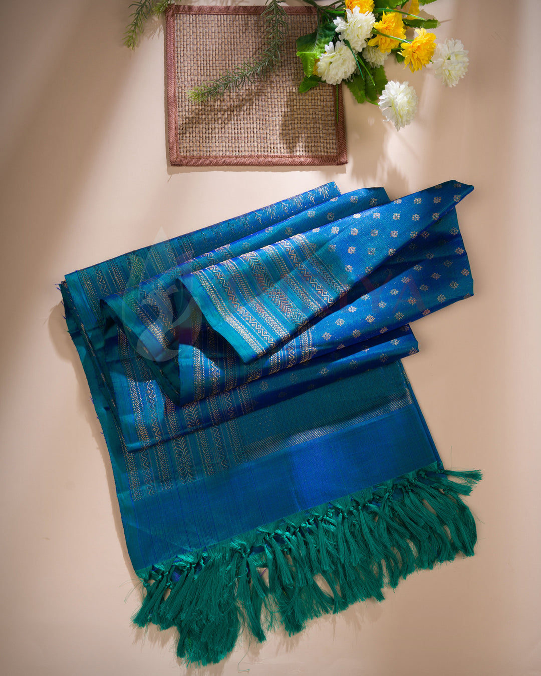 Royal blue silk dupatta with gold zari motifs and tassel edging