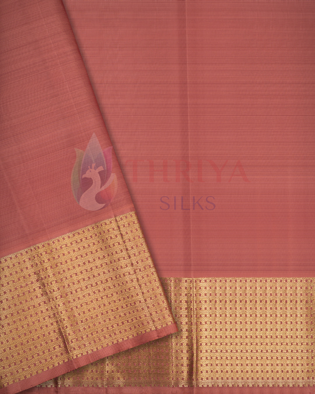 Folded view of terracotta pink Kanjivaram silk saree with plain body and rich gold zari border – Thriya Silks