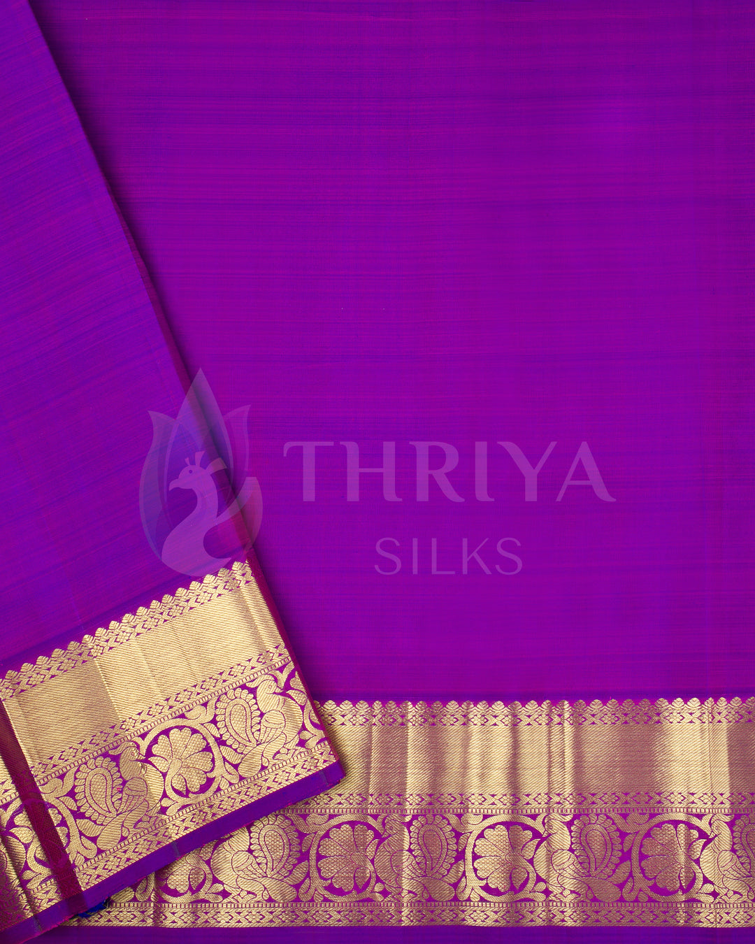Back view of matching blouse piece in deep purple with classic gold zari border 